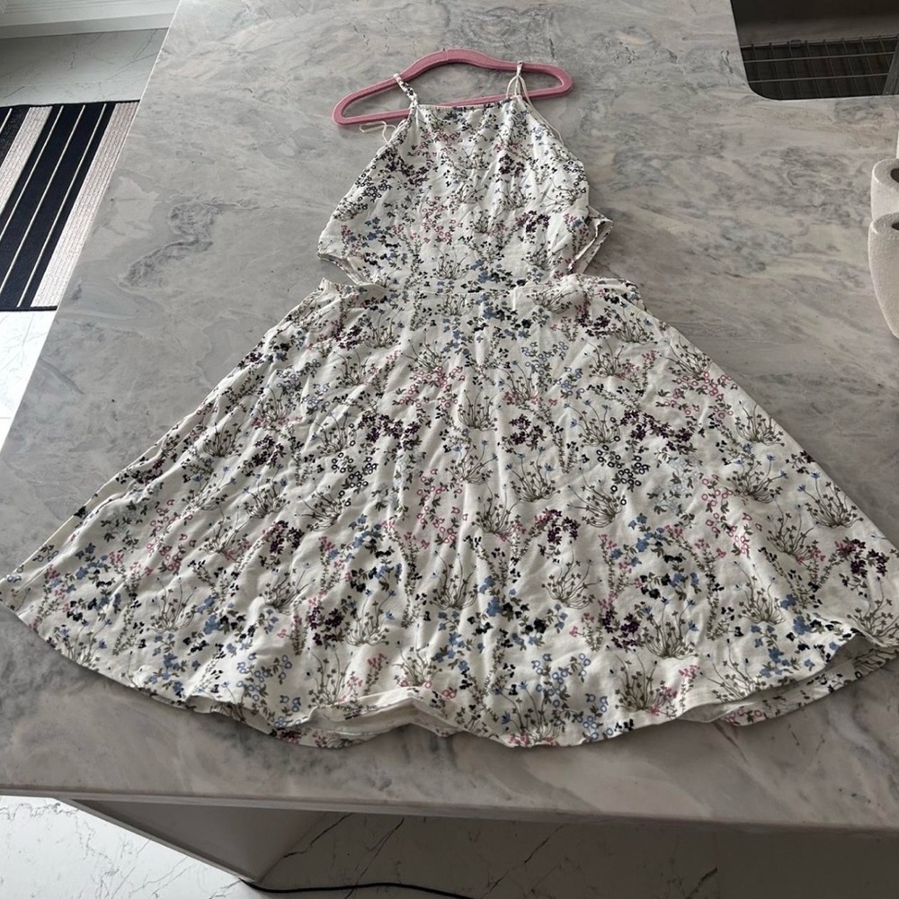 Garage white halter neck floral dress with cut outs on the sides